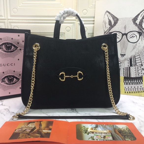 G*u*i shopping bags